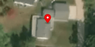 House image located at Six Lakes, MI 48886